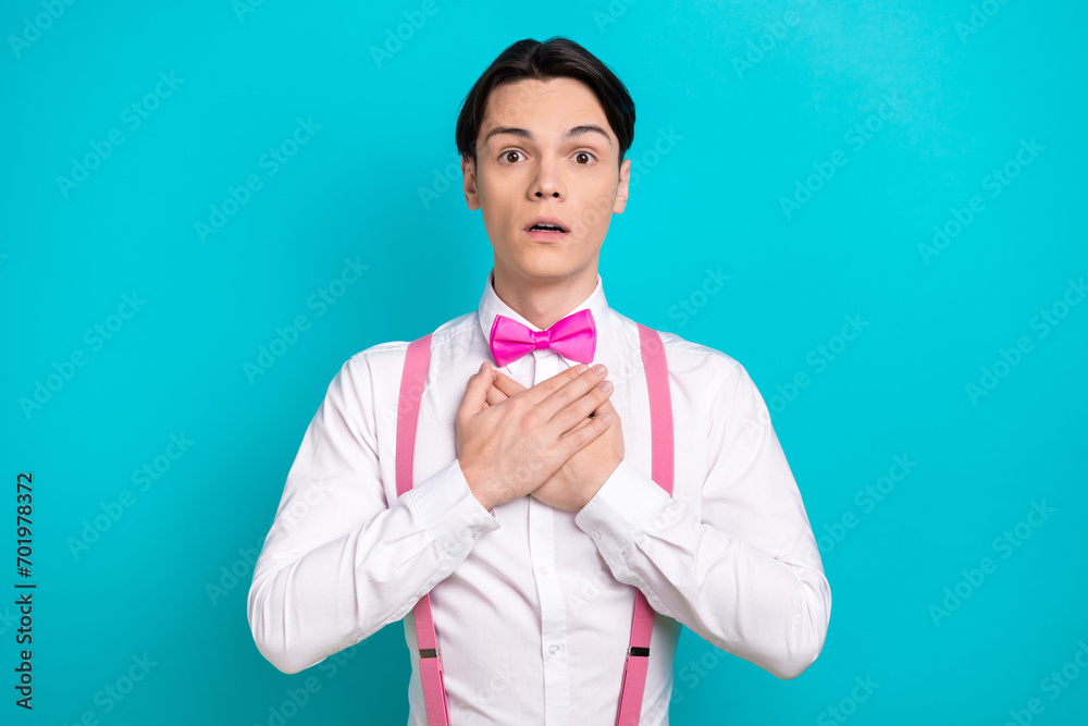 Sticker Photo portrait of handsome young guy touch chest frightened reaction wear trendy pink garment isolated on cyan color background