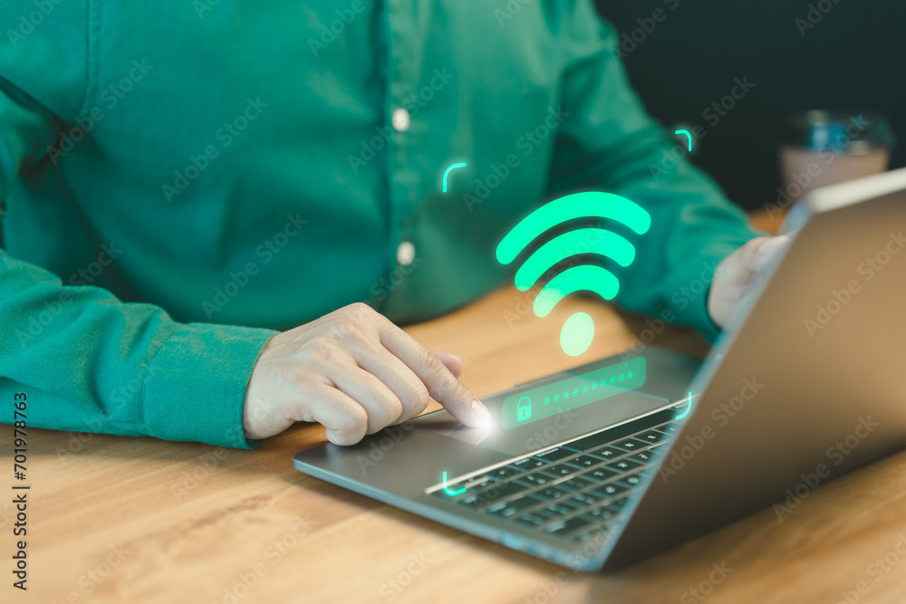 Poster Adult man searching and connect for wifi on his a computer laptop in the cafe. Concept of technology connectivity and connection problems to wifi by computer.