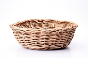Obraz premium Handcrafted wicker basket on white background