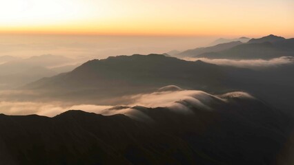 Misty and cloudy landscape, mountains, valleys, Beautiful golden fields in the morning in Myanmar
