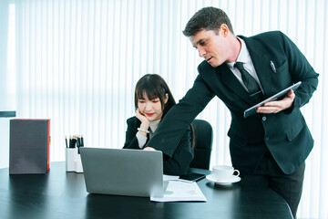 Fototapeta premium business women and men discussing project planning and business analysis, financial planning, working on marketing research,