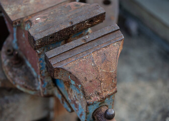 Close-up of old rusty metal vise. Shallow depth of field.