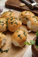 Traditional Ukrainian bread (Pampushky) with garlic on parchment