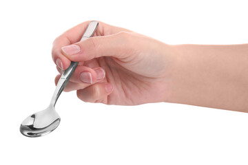 Woman holding new shiny spoon on white background, closeup
