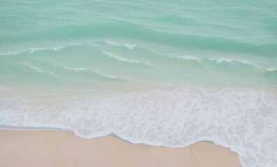 Fototapeta na wymiar A close-up soft wave of the sea on the sandy white beach from AI Generative