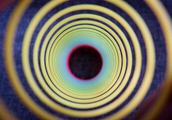 Rainbow spring toy spiral neon color circle pattern