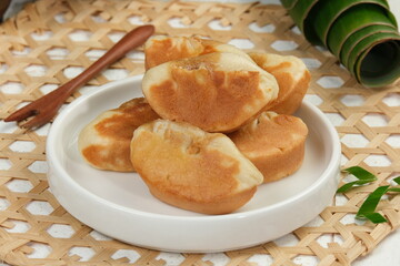 Kue Pukis or pukis cake , Traditional Javanese half-moon shaped pancakes. made from flour eggs...