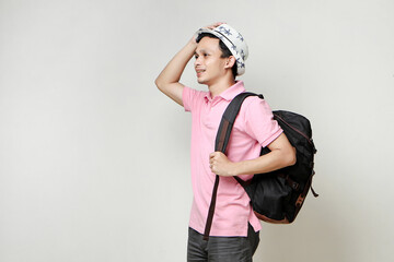 Asian man backpacker portrait. digital nomad and travelling concept. on isolated background