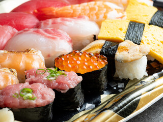 Different types of sushi on a plate