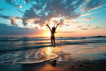 A determined woman on the beach at dawn, her joyful jump symbolizing the overcoming of obstacles and the welcoming of a sunrise filled with new possibilities. - obrazy, fototapety, plakaty