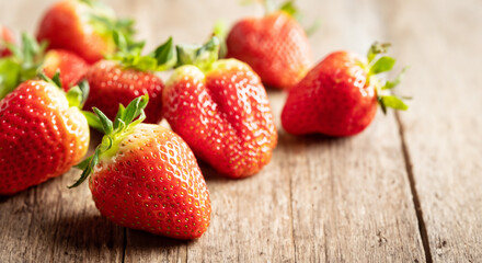 fresh strawberries on a chopping board
