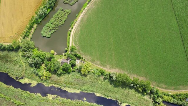 Endless plain agricultural lands creating patchwork viewed from above