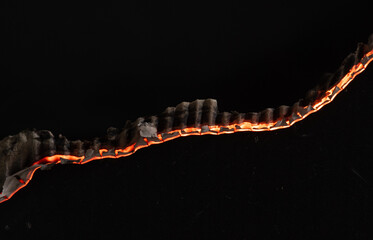 Burning paper on black background,Burnt paper edges.