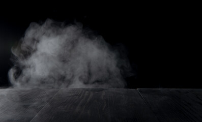 Fog In Darkness - Smoke And Mist On Wooden Table - 702025716