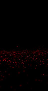 Red hearts loop slow motion on clean black vertical background. Concept Valentine's day copy space seamless loop animation.