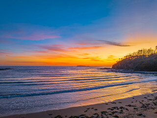 Sunrise at the seaside with high clouds