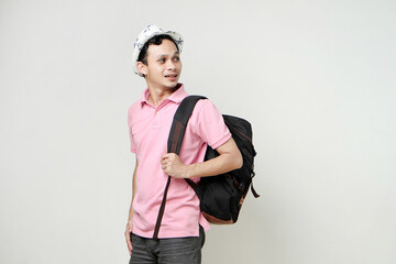 Asian man backpacker portrait. digital nomad and travelling concept. on isolated background