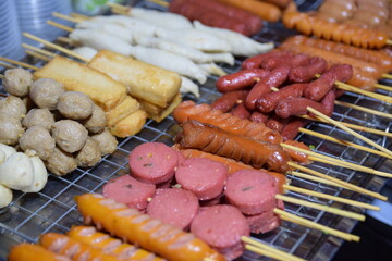 sausages on the grill. Street food in Thailand.