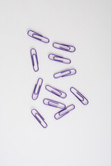 Colorful paper clip isolated on white background