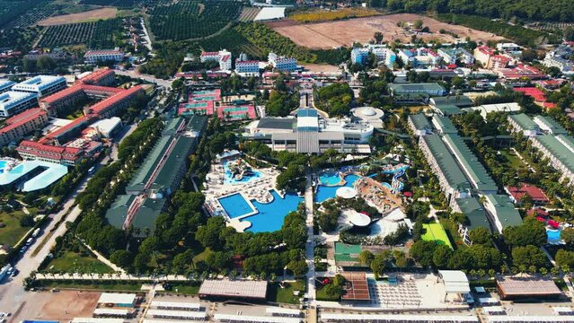 Aerial 4K drone footage of Kiriş-
Kemer (Antalya, Turkey).  Mediterranean sea, beach, cityscape (hotels and resorts), and mountains &ndash; filmed in a vibrant summer time.