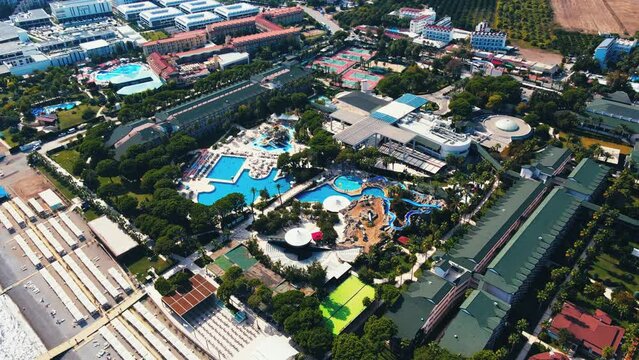 Aerial 4K drone footage of Kiriş-
Kemer (Antalya, Turkey).  Mediterranean sea, beach, cityscape (hotels and resorts), and mountains &ndash; filmed in a vibrant summer time.