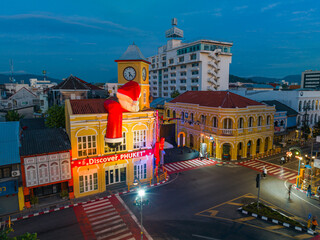 Fototapeta na wymiar Phuket,Thailand-December,31,2023: .aerial view beautiful decorate on the clock tower the ancient building in Phuket city decorated for New Year celebrations. .landmarks in Phuket City in twilight..