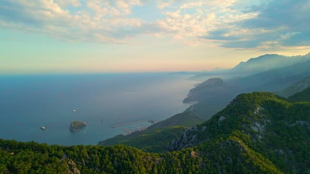 Aerial 4K drone video of a Rat island near Tunektepe Teleferik
Cable station positioned on top of the hill with the mountains in the background. Filmed in summer. Located in Antalya, Turkey.