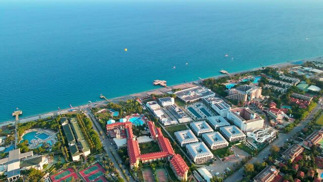 Aerial 4K drone footage of Kiriş-
Kemer (Antalya, Turkey).  Mediterranean sea, beach, cityscape (hotels and resorts), and mountains &ndash; filmed in a vibrant summer time.