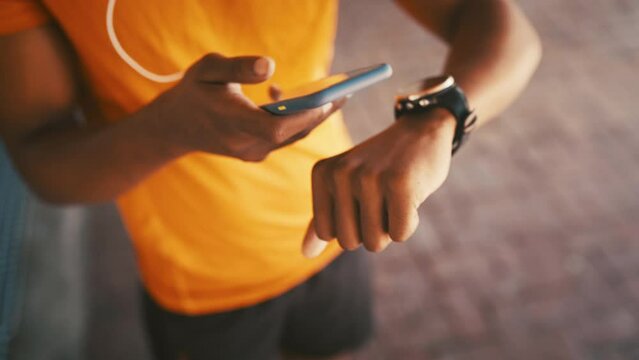 Hands, watch and smartphone, time fitness outdoor for health tracking and cardio with tech for exercise. Measure heart rate, training for sports and athlete person monitor progress with mobile app