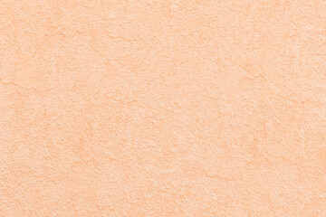 aesthetic Peach Fuzz plaster or stucco background
