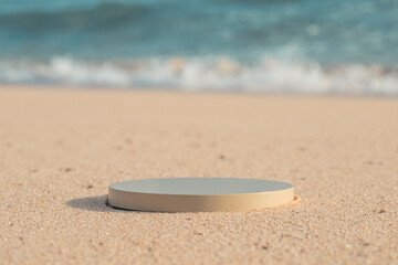 Fototapeta na wymiar Beige platform on the beach for standing product against the ocean background