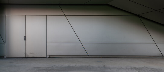 Metal facade of modern building with ramp