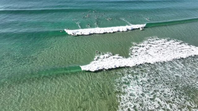 surfing surfers manly beach sydney australia aerial drone footage 4k turquoise waves