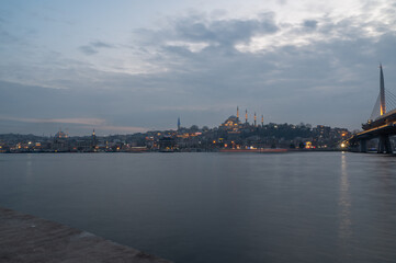 Istanbul, Turkey - December 30, 2023: Halic Bridge, Ahi Çelebi Mosque, 