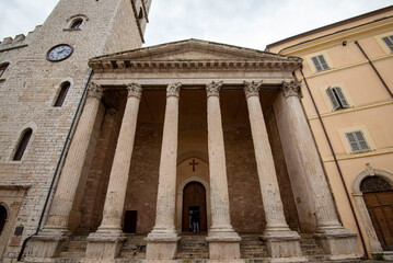 Fototapeta premium Popolo Tower and Church of Santa Maria sopra Minerva - Assisi - Italy