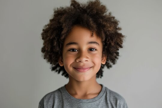 Portrait Of A Cute African American Little Boy Smiling At Camera