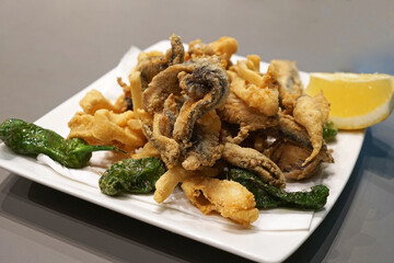 Close up battered and deep fried anchovies fish