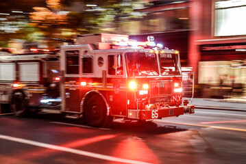 New York, NY USA Fire truck with emergency lights on the street of Manhattan
