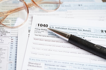 Tax form 1040 U.S. Individual Income Tax Return, business finance concept.