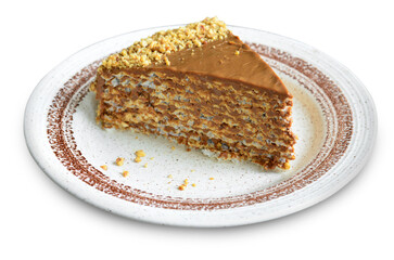 Waffle cake with condensed milk cream and walnuts on White Background