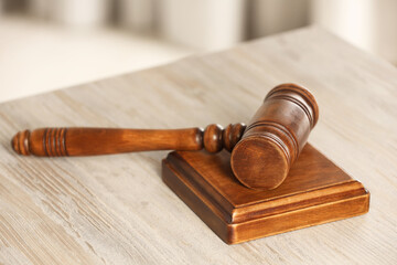 Law concept. Gavel on wooden table, closeup