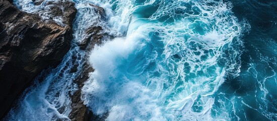 Aerial view of powerful wave breaking near shore. with copy space image. Place for adding text or design