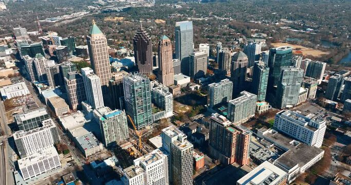 Downtown Atlanta Georgia aerial view. High skyscrapers, construction with cranes, autumn park. Sunny day. Aerial View Atlanta Buckhead.