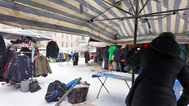 Plac Nowy city market, in the Jewish district. Krakow on a winter, snowy day. Europe
