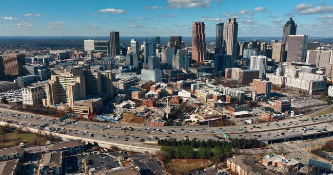 Autumn city of Atlanta. Aerial view of Buckhead Atlanta road traffic flow with skyline buildings, Georgia, USA