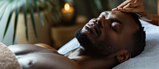 Zelfklevend behang Massagesalon Black man spa and body massage for couple wellness relax therapy and skincare treatment Salon therapist touch muscle reflexology and healing of sleeping african guy on bed stress relief and zen