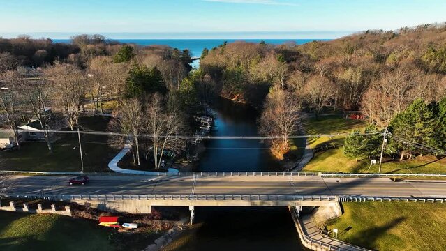 A bridge near a park of natural sand dunes.