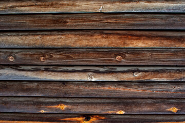 Fototapeta premium Dark brown vintage wooden background.