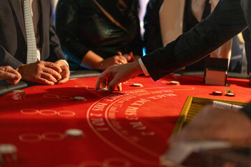 High Roller Placing Bets at Luxury Casino Table