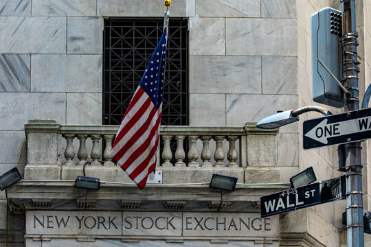 New York, USA; June 1, 2023: The New York Stock Exchange building on Wall Street, with its American flag that is known around the world.